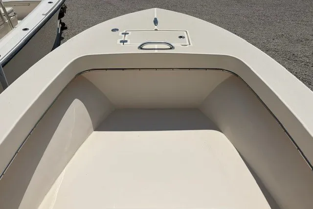 Slide: The Image of 2022 Jones Brothers Cape Fisherman 20 boat interior, showcasing spacious seating and storage. - 7