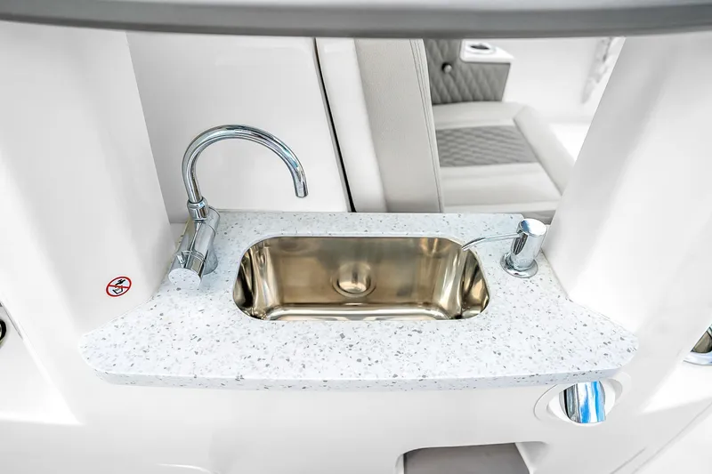 Slide: The Image of Luxury sink on 2025 Solace 37CS boat with sleek faucet and modern design. - 90