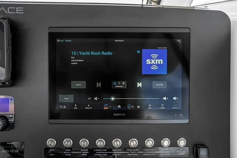 Slide: The Image of Touchscreen control panel on 2025 Solace 37CS yacht displaying SiriusXM Yacht Rock Radio. - 49
