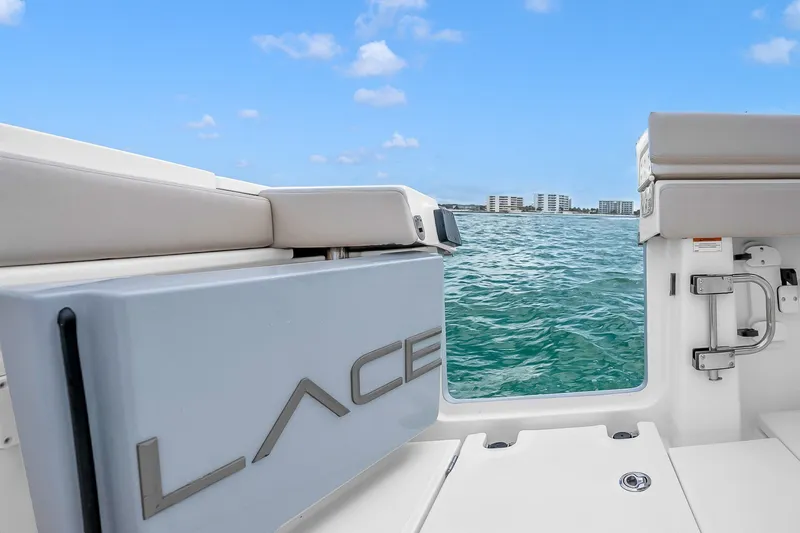 Slide: The Image of 2025 Solace 37CS boat interior with ocean view and modern seating. - 68