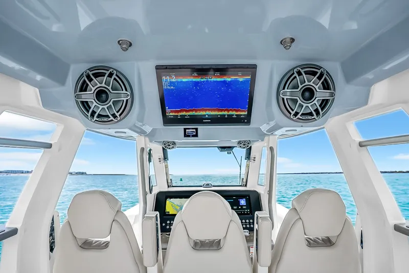 Slide: The Image of Interior view of 2025 Solace 37CS boat with advanced navigation system and speakers. - 58