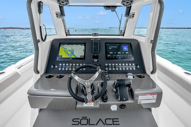 Slide: The Image of Helm of 2025 Solace 37CS boat with advanced navigation and control systems. - 46