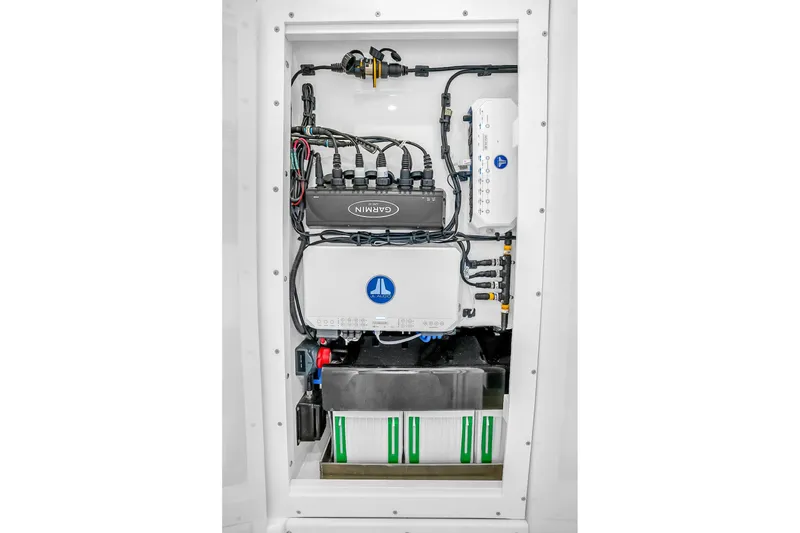 Slide: The Image of Electrical system of 2025 Solace 37CS boat featuring Garmin components. - 75