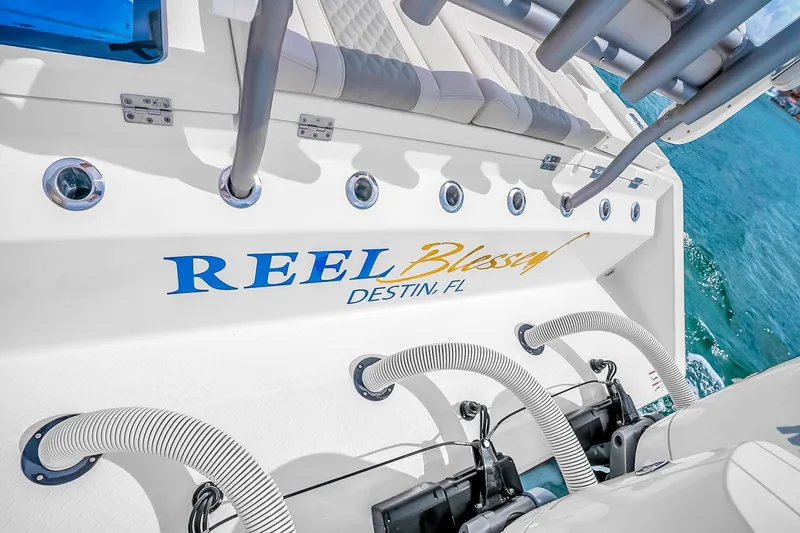 Slide: The Image of 2025 Solace 37CS boat with "Reel Blessy" name, docked in Destin, FL. - 69