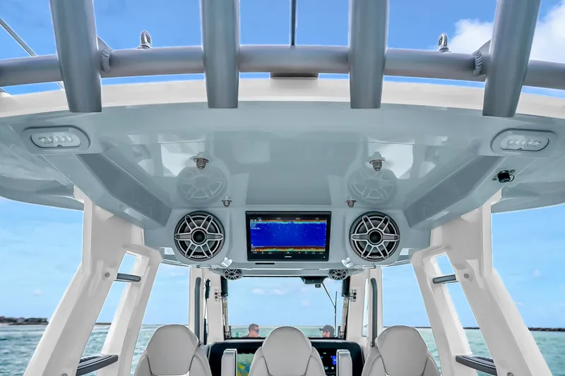 Slide: The Image of 2025 Solace 37CS boat interior with advanced navigation system and speakers. - 59