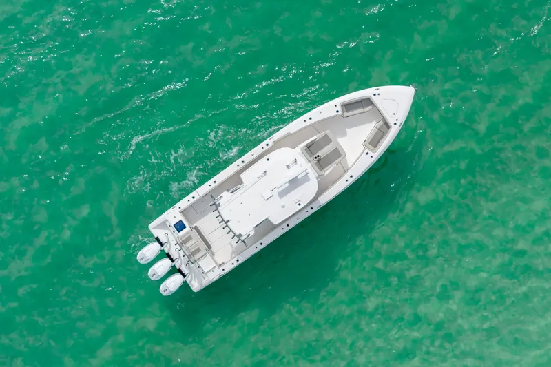 Slide: The Image of Aerial view of 2025 Solace 37CS boat on turquoise water. - 32
