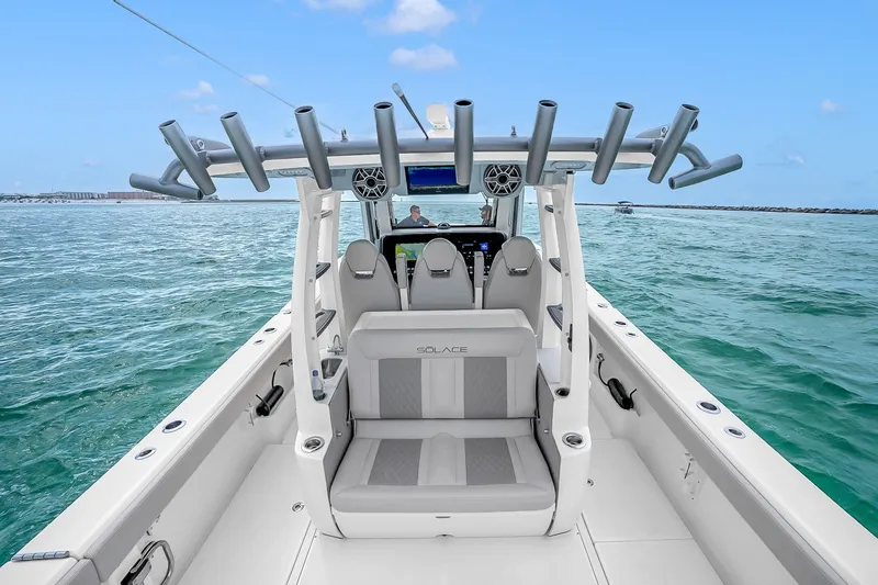 Slide: The Image of 2025 Solace 37CS boat on open water, featuring sleek design and advanced technology. - 44