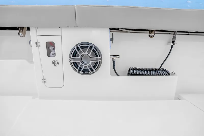 Slide: The Image of 2025 Solace 37CS boat interior with speaker and coiled hose detail. - 89