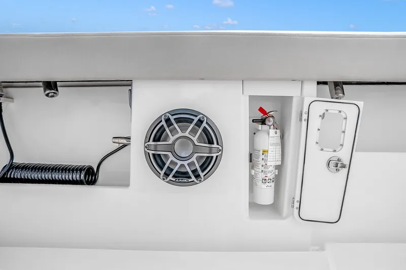 Slide: The Image of 2025 Solace 37CS boat interior with speaker and fire extinguisher. - 76