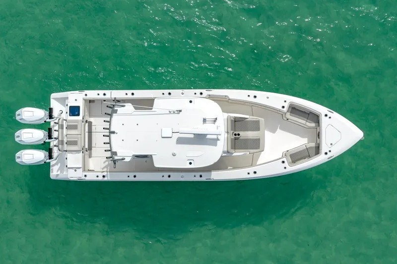 Slide: The Image of Aerial view of 2025 Solace 37CS boat on turquoise water. - 33