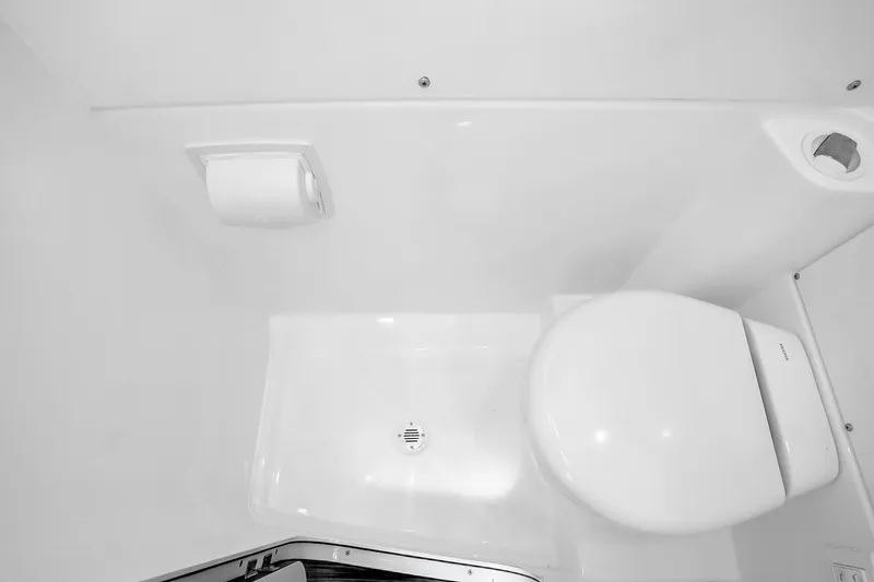 Slide: The Image of 2025 Solace 37CS boat bathroom with toilet and shower area. - 41