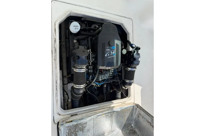 Slide: The Image of 2003 Baha Cruisers 277 GLE engine compartment with visible components and wiring. - 17