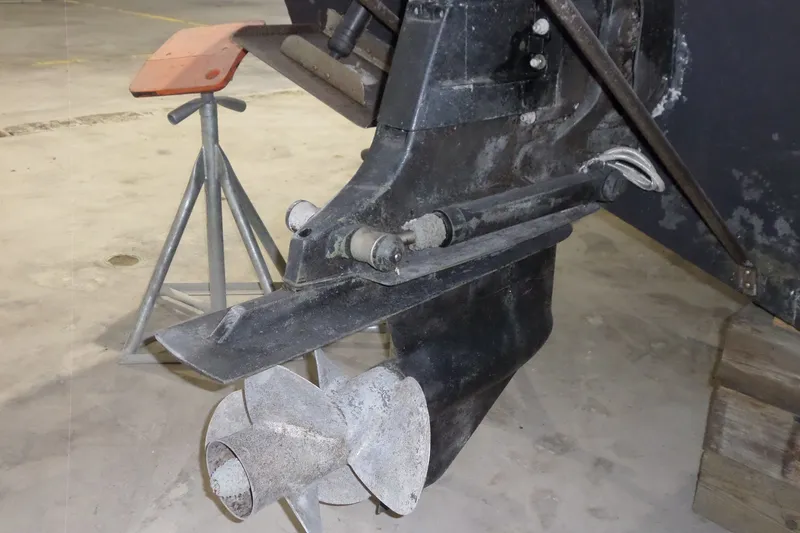 Slide: The Image of Close-up of a 2008 Bayliner 320 Cruiser boat propeller and drive system. - 61
