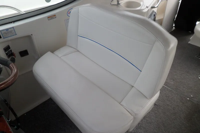 Slide: The Image of White seating in 2008 Bayliner 320 Cruiser boat interior. - 21
