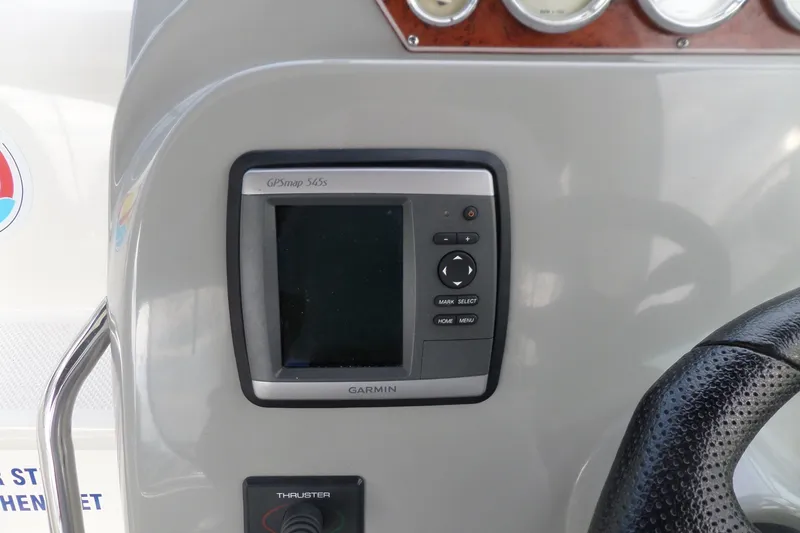 Slide: The Image of Garmin GPSmap 545s on 2008 Bayliner 320 Cruiser dashboard, featuring navigation controls. - 8
