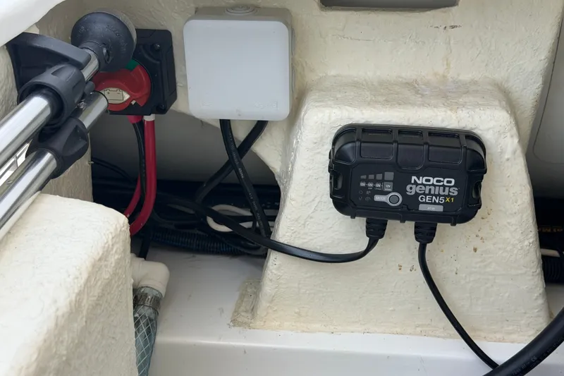 Slide: The Image of NOCO Genius GEN5X1 charger installed on 2022 Walker Bay Generation 450 boat. - 17