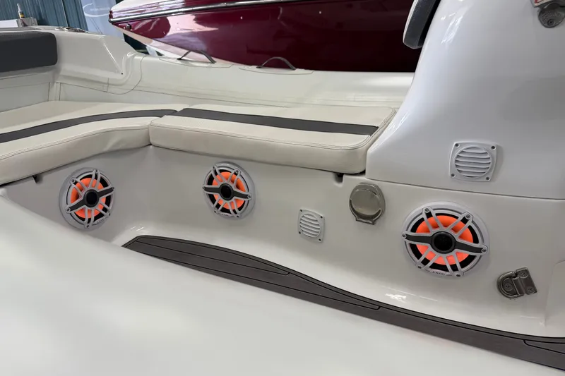 Slide: The Image of 2022 Walker Bay Generation 450 boat interior with speakers and cushioned seating. - 26