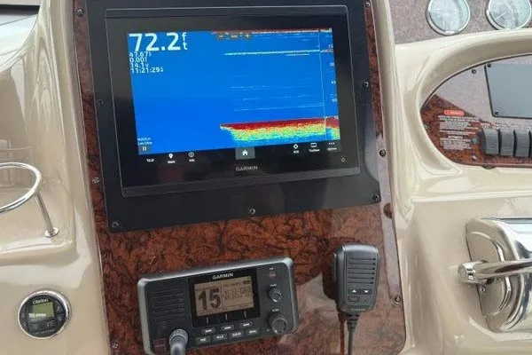 Slide: The Image of Control panel of a 2003 Sea Ray 380 Sundancer with Garmin navigation equipment. - 4
