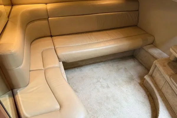 Slide: The Image of Luxurious beige leather seating in 2003 Sea Ray 380 Sundancer yacht interior. - 47