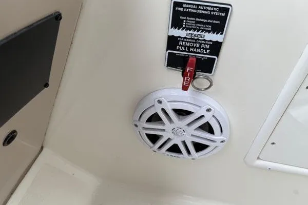 Slide: The Image of Fire extinguisher system and speaker on 2003 Sea Ray 380 Sundancer boat interior. - 71