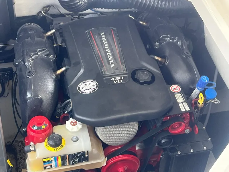 Slide: The Image of 2022 Regal LS36 engine compartment featuring a Volvo Penta 430 V8 engine. - 33