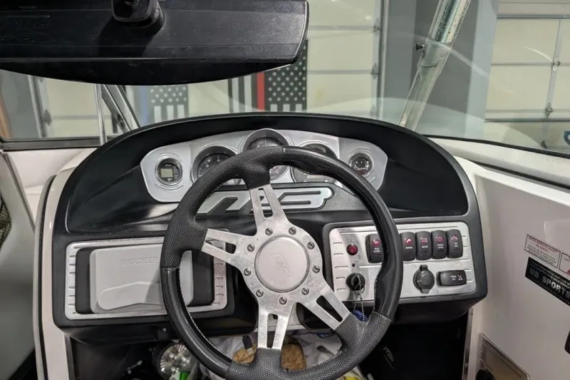 Slide: The Image of Steering wheel and dashboard of 2011 MB F21 Tomcat boat. - 8