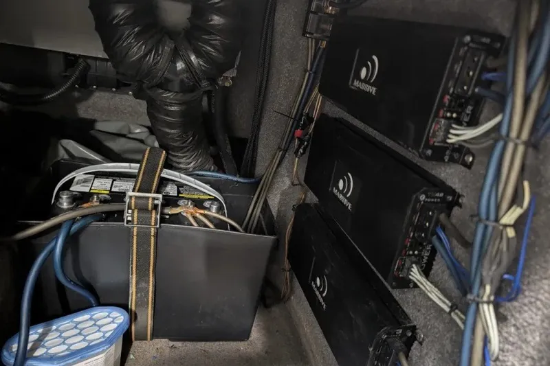 Slide: The Image of Interior of 2011 MB F21 Tomcat showing battery and audio amplifiers setup. - 10