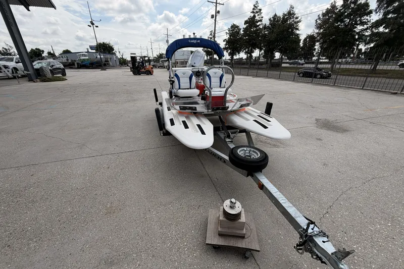 Slide: The Image of 2024 Craig Cat E2 Elite on trailer in outdoor parking lot. - 6