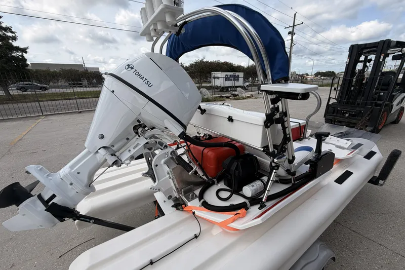 Slide: The Image of 2024 Craig Cat E2 Elite with Tohatsu motor, featuring a sleek design and modern equipment. - 7