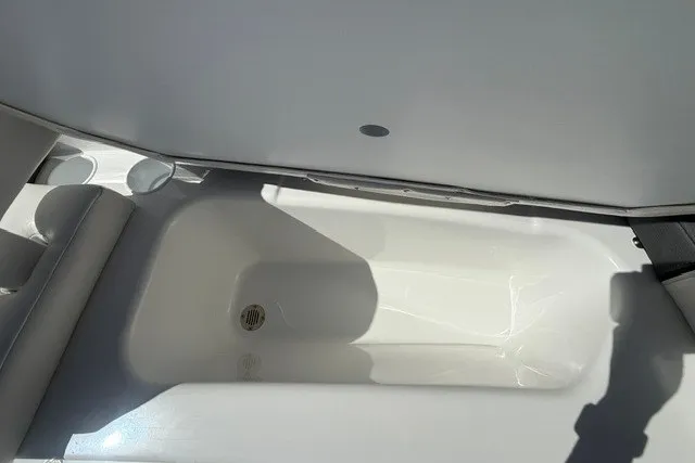 Slide: The Image of Interior view of a 2027 Tahoe T16 boat storage compartment. - 15