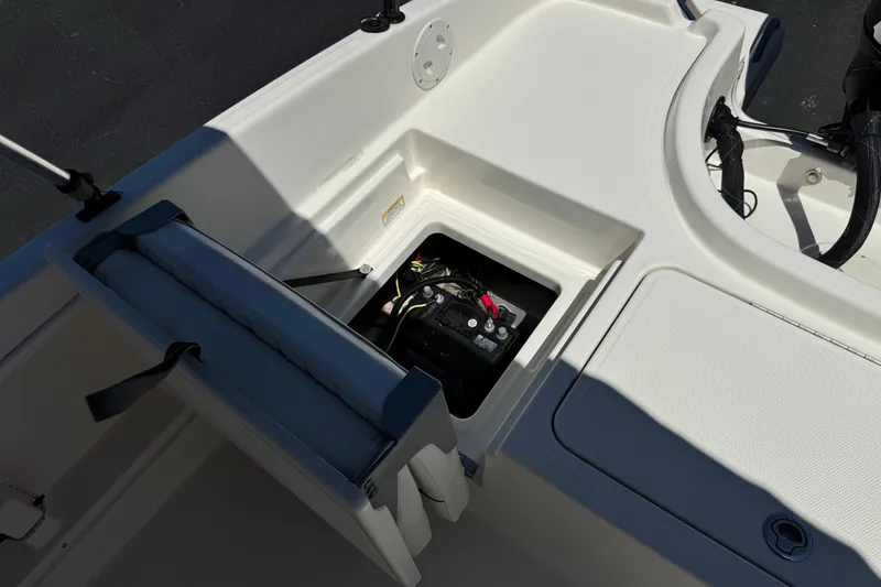 Slide: The Image of 2022 Trophy T18 Bay boat battery compartment with open hatch. - 17