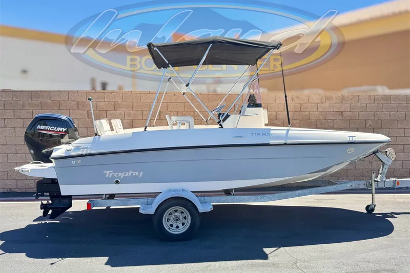 The Image of 2022 Trophy T18 Bay boat on trailer with Mercury engine, outdoor display. - 0
