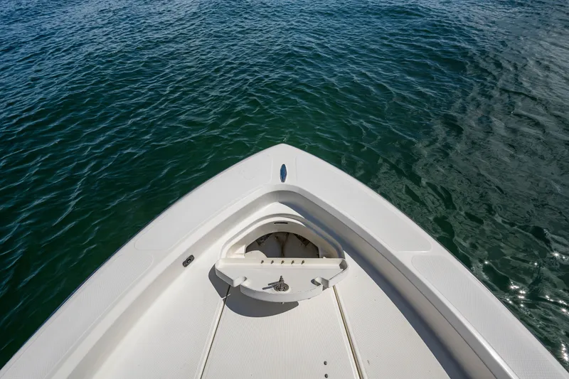 Slide: The Image of Bow of 2010 Hydra-Sports Bay Bolt 23 boat on calm water. - 7