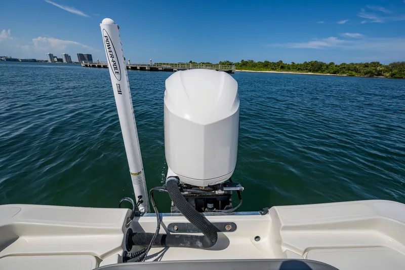 Slide: The Image of 2010 Hydra-Sports Bay Bolt 23 boat with Power-Pole anchor on calm water. - 17