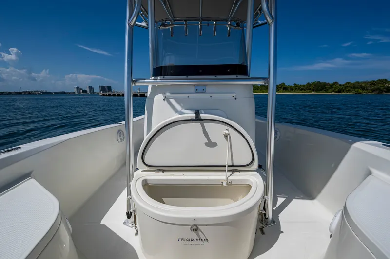 Slide: The Image of 2010 Hydra-Sports Bay Bolt 23 boat interior with open storage, ocean view. - 9