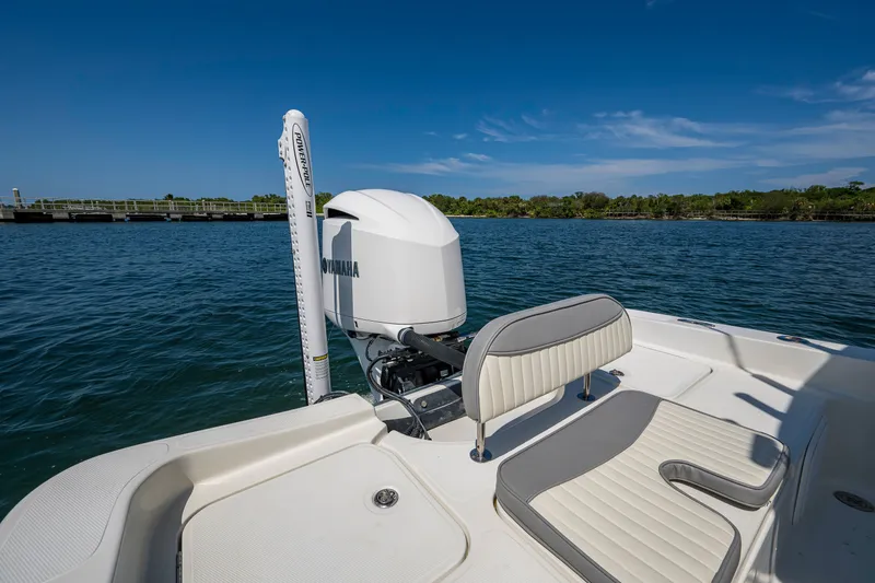 Slide: The Image of 2010 Hydra-Sports Bay Bolt 23 boat with Yamaha motor on calm water. - 15