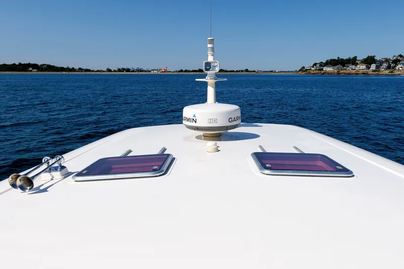 Slide: The Image of Bow view of 2013 Sabre 42 Salon Express on open water. - 15