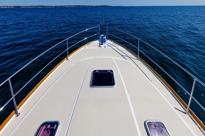 Slide: The Image of Bow view of 2013 Sabre 42 Salon Express yacht cruising on open sea. - 12