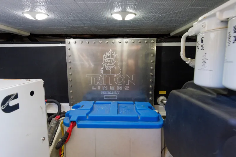 Slide: The Image of Engine room of 2013 Sabre 42 Salon Express with Triton Liners equipment. - 44