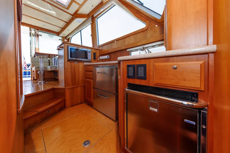 Slide: The Image of Interior of 2013 Sabre 42 Salon Express yacht with modern kitchen amenities. - 32