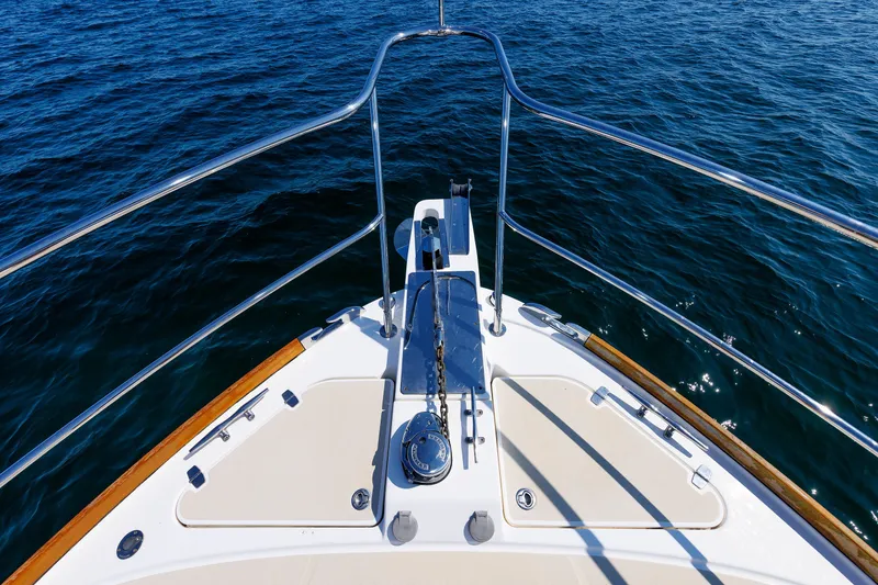Slide: The Image of Bow view of 2013 Sabre 42 Salon Express yacht on open water. - 13