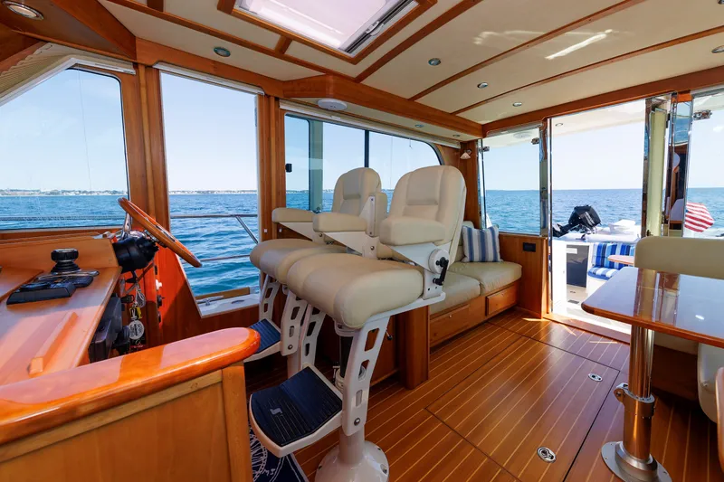 Slide: The Image of Interior of 2013 Sabre 42 Salon Express yacht with luxurious seating and ocean view. - 28