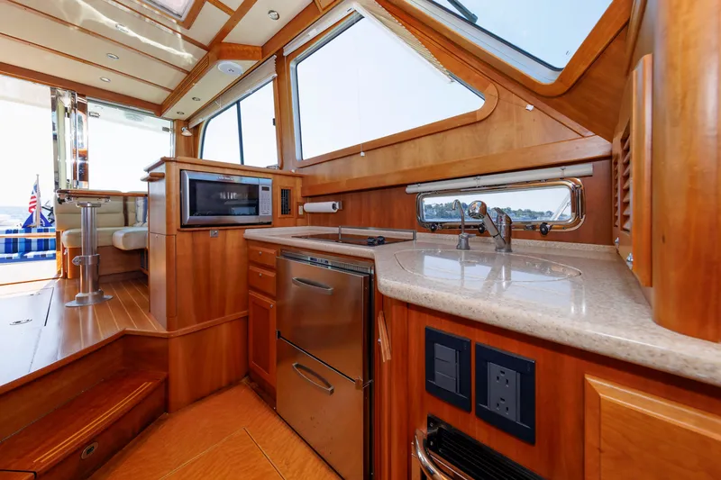 Slide: The Image of Luxurious interior of 2013 Sabre 42 Salon Express yacht with modern kitchen amenities. - 31