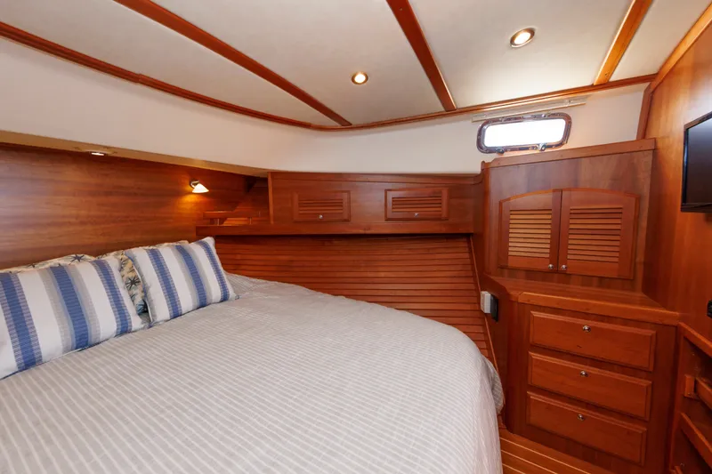 Slide: The Image of Luxurious wood-finished cabin interior of 2013 Sabre 42 Salon Express yacht. - 35