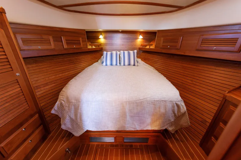 Slide: The Image of Luxurious wooden cabin interior of 2013 Sabre 42 Salon Express yacht with cozy bed. - 33