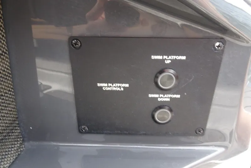 Slide: The Image of Control panel for swim platform on 2022 Cobalt A29 boat. - 13