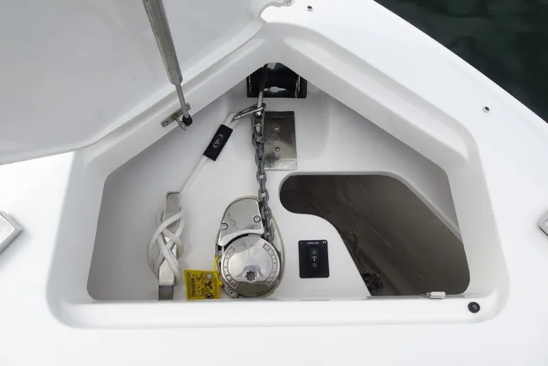 Slide: The Image of Anchor compartment of 2022 Cobalt A29 boat with chain and winch system. - 33
