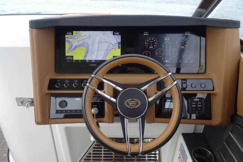 Slide: The Image of Steering wheel and dashboard of 2022 Cobalt A29 boat with navigation screens. - 20