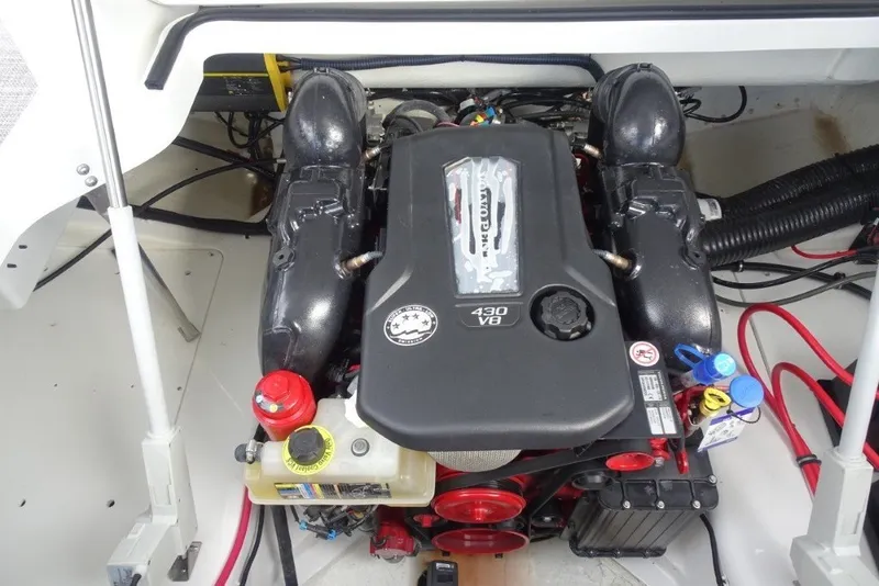 Slide: The Image of Engine compartment of a 2022 Cobalt A29 boat, featuring a powerful 430 V8 engine. - 36