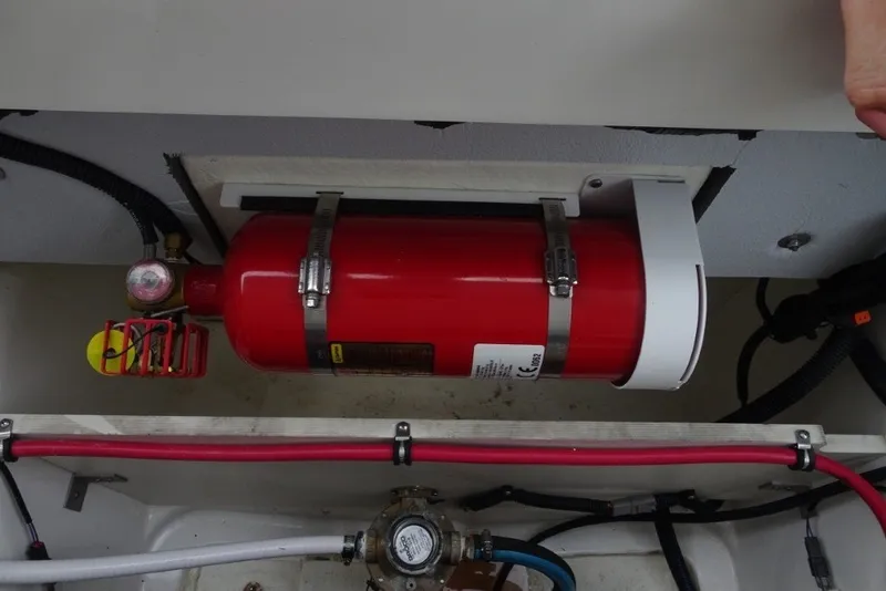 Slide: The Image of Fire suppression system in 2022 Cobalt A29 boat engine compartment. - 37